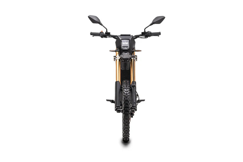 Front view of Komodo L3 electric dirt bike with knobby tire and dual mirrors