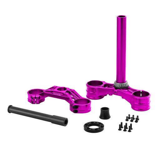 Purple motorcycle triple tree clamp set with black bolts and spacers on white.